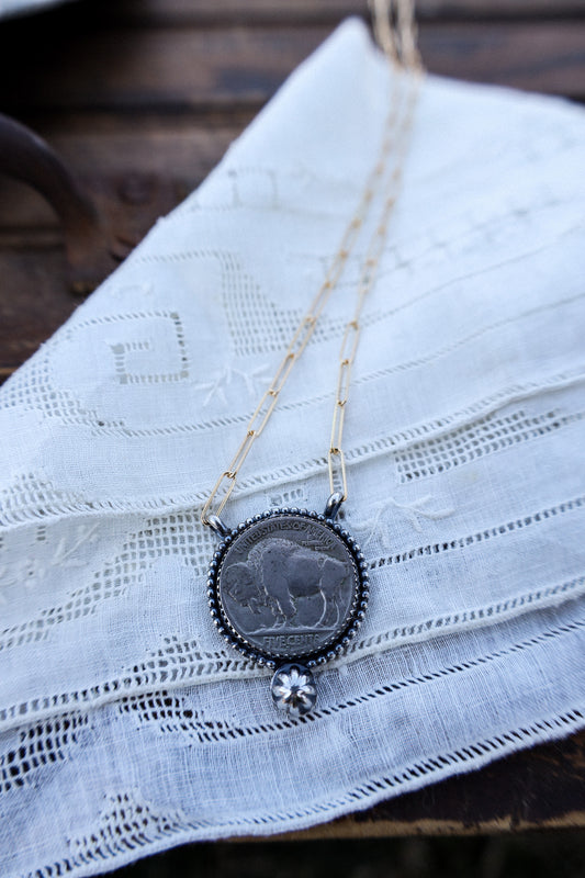 Coin J