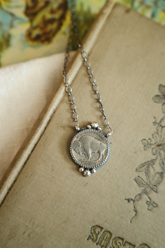 Coin E