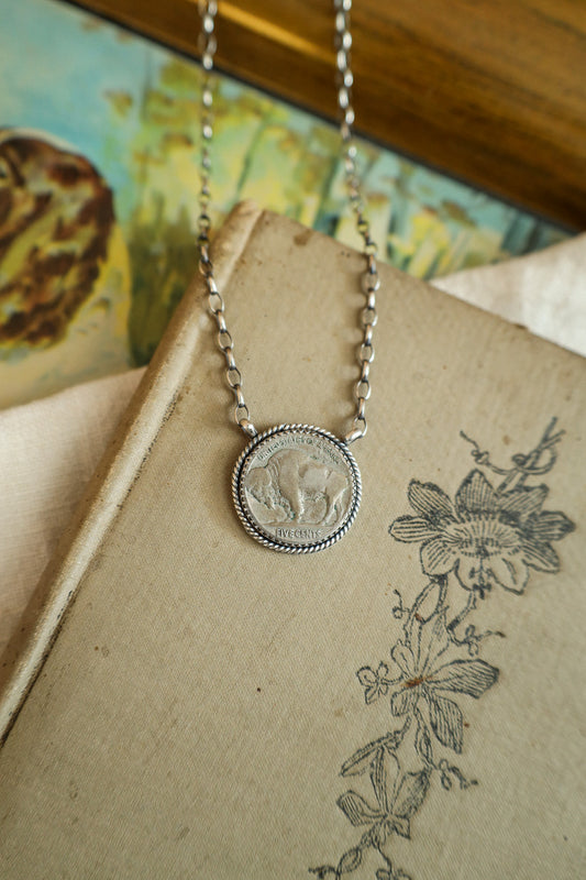 Coin J